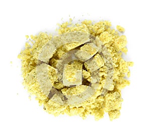 Aromatic crumbled bouillon cube on white background, top view