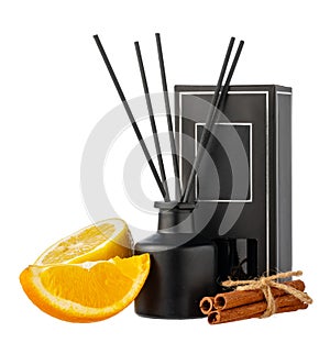 Aromatic diffuser with orange and cinnamon scent on white background
