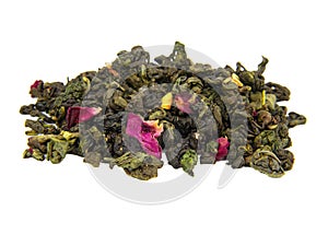 Aromatic green dried tea leaves with mango isolated on the white background