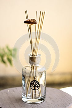 Aromatic home spray air freshener in a transparent glass bottle