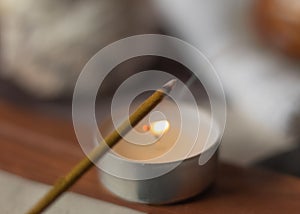 Aromatic incense stick and candle in a spa