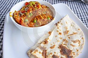 aromatic indian tradition food - vegetable curry with chapatti