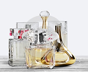 Aromatic Perfume bottles on background