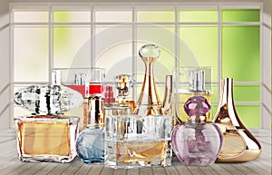 Aromatic Perfume bottles on background