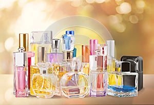Aromatic Perfume bottles on golden background