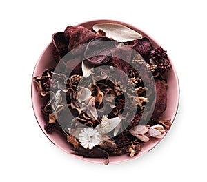 Aromatic potpourri of dried flowers in bowl on white background, top view