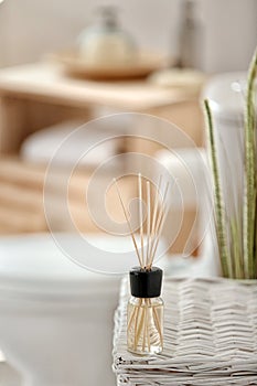 Aromatic reed air freshener on table