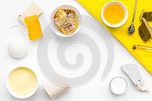 Aromatic theraphy and delicate skin care. Spa set based on honey on white background top view copy space