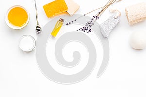 Aromatic theraphy and delicate skin care. Spa set based on honey on white background top view copy space