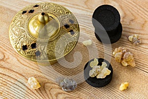 Aromatic yellow resin gum on Arabian charcoals to burn aromatic