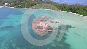 Around a rock in Praslin Island, aerial view from drone, Seychelle Islands