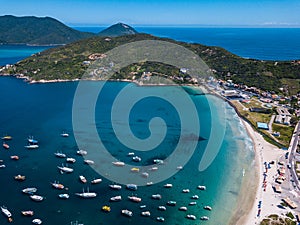 Arraial do Cabo Brazil. Praia dos Anjos. Aerial drone photo from above. Beach ocean and fishing boats. Amazing blue sky