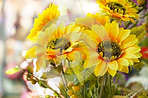 Arranged artificial sun flower bouquet