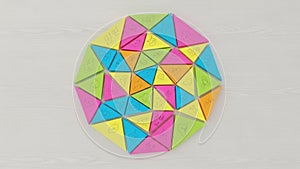 Arranged in a circular pattern with five different colors pink