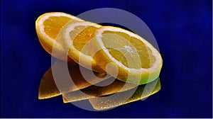 Arranged lemon on a glass surface.