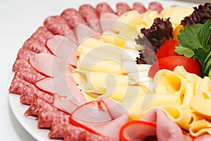 Arranged meat and chees products photo