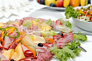 Arranged meat and chees products photo