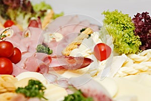 Arranged meat and chees products photo