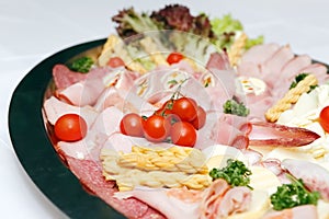 Arranged meat and chees products photo