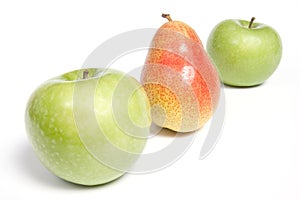 Arranged pear and green apples