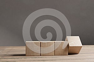 Arranged wood cube stacking as shape, mock up for create symbol, business growth and management concept