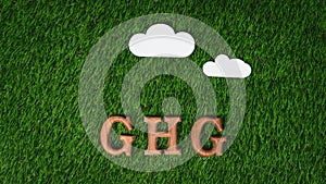 Arranged wooden alphabet text in GHG with greenhouse gases icon. Gyre photo