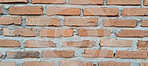 The arrangement of bricks on the walls of the house