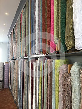 Arrangement of brocado cloth in the shop photo