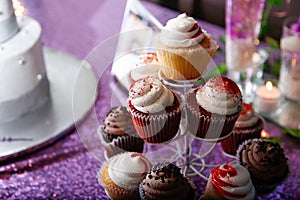 arrangement of cupcakes at event