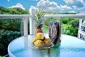 An arrangement of Hawaiian fruit on a table outside in Maui, Hawaii.