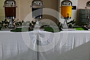Arrangement of large amounts of food for buffet meals in hotel restaurant banquet rooms.