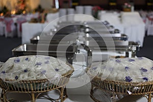 Arrangement of large amounts of food for buffet meals in hotel restaurant banquet rooms.