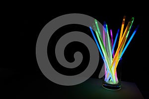 Arrangement of multi-colored glow sticks