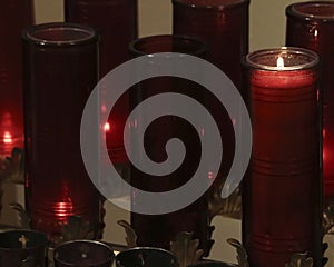 An Arrangement of Prayer Candles in a Church