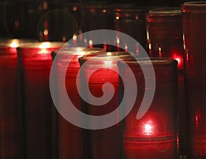 An Arrangement of Prayer Candles in a Church