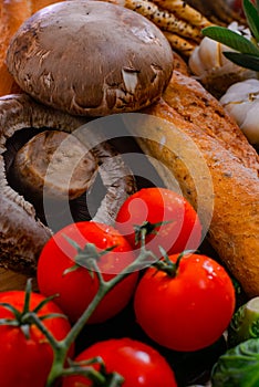 The arrangement of various breads and vegetables is still