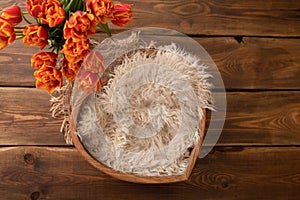 Arrangement of wool in the form of a heart and tulips