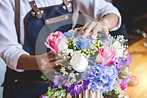 Arranging artificial flowers vest decoration at home, Young woman florist work making organizing diy artificial flower, craft and