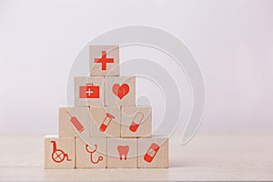 Arranging wood block stacking with icon healthcare medical, Insurance for your health concept