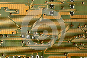Array of conducting tracks masked on PCB with VIA hole