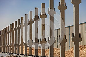 Array of precast concrete beams during installation at construction site