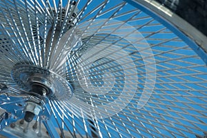 An array of spokes on a bicycle wheel