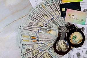 Arrest in the use of crime other people's credit cards, US dollar banknotes money cash handcuffs and fingerprint record