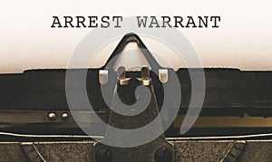 Arrest Warrant on vintage type writer from 1920s photo