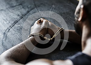 Arrested African man with handcuffs