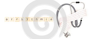 Arrhythmia. Stethoscope with electrocardiogram sheet isolated on white background. Place to copy paste.