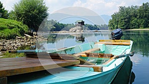 Arrival by boat to the popular, unique Drina house on a rock in the middle of a river in Serbia