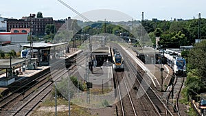 Arrival of a regional passenger train at Wuppertal-Oberbarmen station. View from above