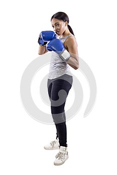 Arrogant Black Female Wearing Boxing Gloves