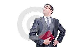 Arrogant man with book in light studio